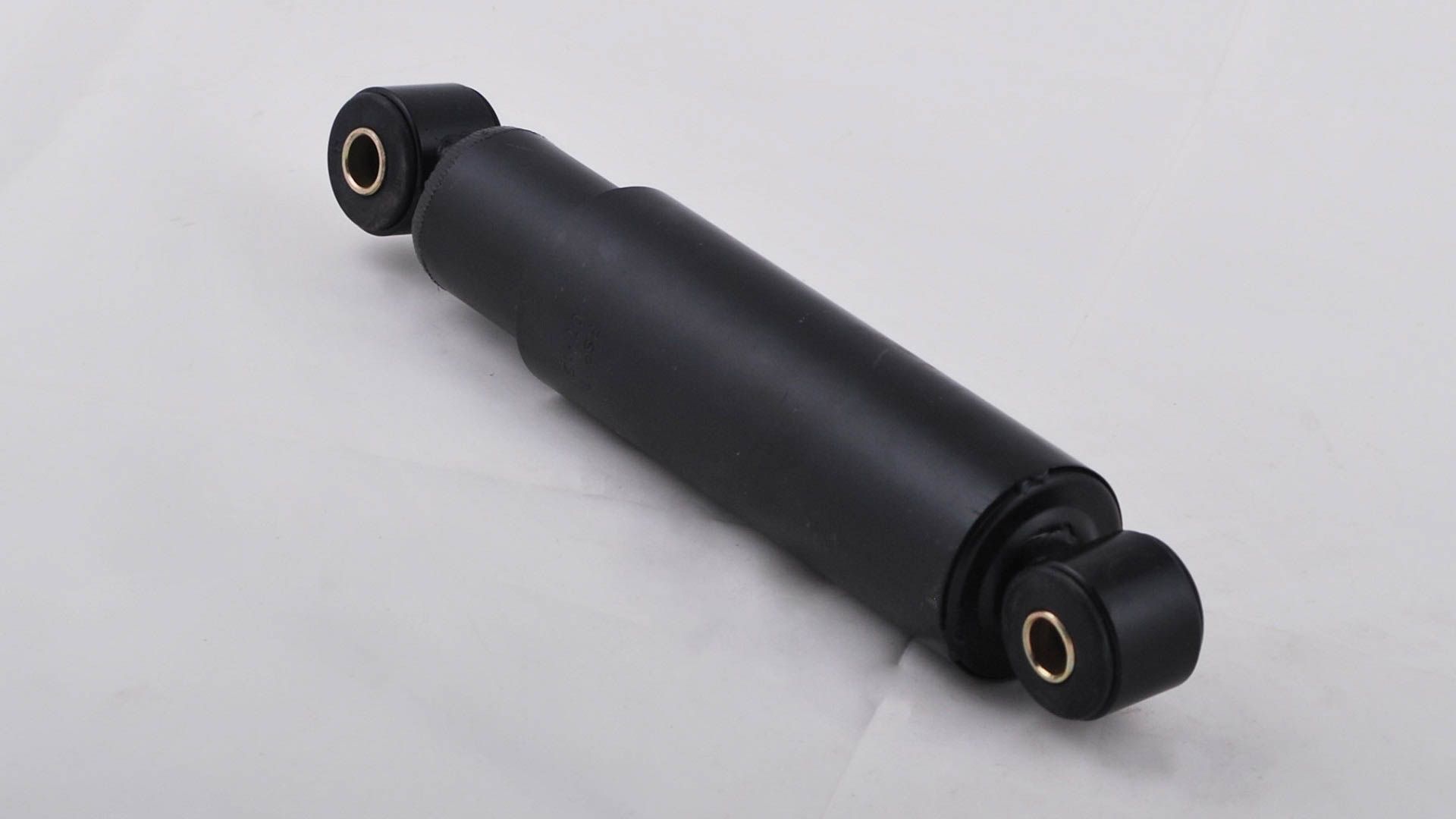 Støtdemper for bladfjær aksling